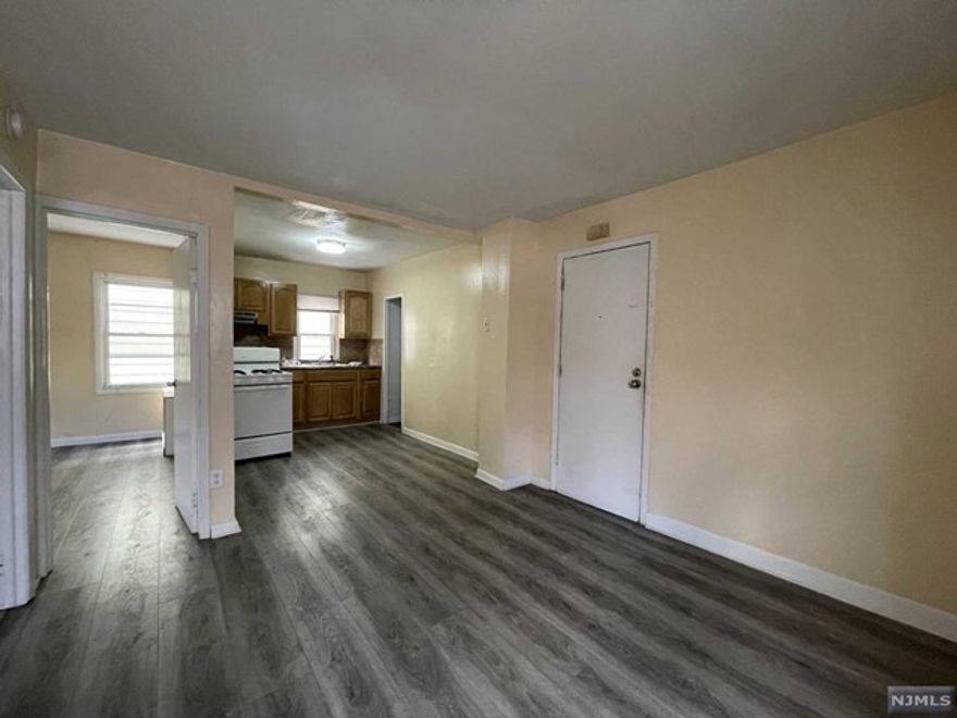 Prime Location!! Come check out this cozy 1st floor apartment conveniently located within walk in distance to all shops, schools, parks and train station, and laundromat on next block. This well kept apartment offers 2 bedrooms, living room and kitchen with all new floors and recently painted. Call today for a private tour
