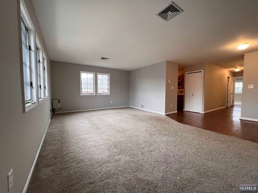 FANTASTIC BUILDING w/PRIDE of OWNERSHIP Throughout! JUST RENOVATED apartment in Prime Nutley Location! This SPACIOUS CORNER UNIT is sun filled and features a large living room/dining room, kitchen with pantry, master bedroom with generous walk in closet and renovated half bath. A second bedroom also features large closets and a renovated full bath just steps away. An additional hall closet is available for added storage. Additional upgrades include soft close vanities, new light fixtures throughout and usb wall outlet adapters. Freshly painted and available for immediate occupancy. One reserved parking space included. An additional parking space may be available between 8pm-9am. Utilities are responsibility of Tenant. No Pets. In unit Washer/Dryer hookups available in pantry. Washer/Dryer in Unit. Only steps away from Mass transit!