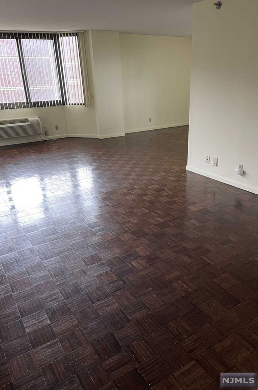 Bright large 1 bedroom in highly sought after World Plaza. Updated bathroom. Hardwood parquet floors throughout. City view. 24 hr. security. Pool. Gym. Indoor parking assigned to rental. Close to all transportation, shopping, schools.
