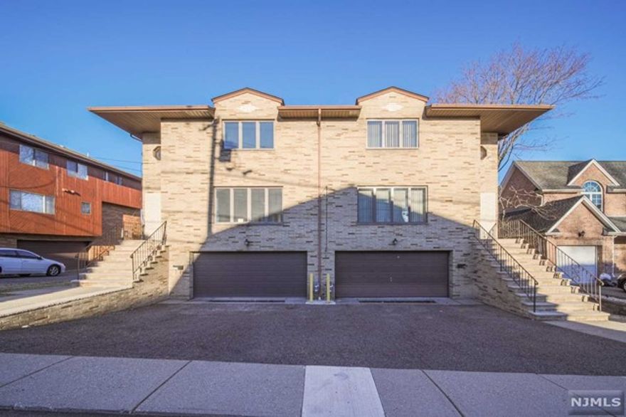 Recently renovated Over sized (75x120) side/side home in a prime location of Fort Lee. Step into the marble step entrance with winding staircase. Brand new modern eat-in kitchens, elegant bathrooms, and hardwood flooring already in place. Location also offers close convenience to NYC transportation, walking distance to school #3,restaurants, shopping, grocery stores, places of worship .Each side has 3Bedrooms and 2.5bathroom ,2car garage with storage room.