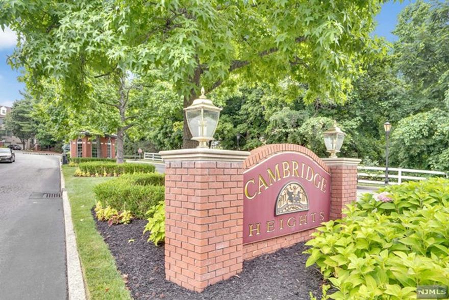 RARE OPPORTUNITY FOR A METICULOUSLY KEPT UNIT WITH TWO DEEDED PARKING SPACES! THIS FRESHLY PAINTED 2 BEDROOM, 2 BATH UNIT OFFERS AN OPEN FLOOR PLAN FEATURING A LIVING ROOM WITH VAULTED CEILING, EAT IN KITCHEN, LARGE BREAKFAST BAR, OVERSIZED FIRST FLOOR BEDROOM THAT COULD BE USED AS A FIRST FLOOR MASTER, FULL BATH, LAUNDRY ROOM WITH FULL SIZE WASHER AND DRYER. SECOND FLOOR WITH LOFT/OFFICE AREA, LARGE MASTER BEDROOM WITH DOUBLE CLOSETS AND FULL BATH. CONVENIENTLY LOCATED NEAR POOL AND CLUBHOUSE. CAMBRIDGE HEIGHTS OFFERS 24 HOUR GATED SECURITY,NEWLY RENOVATED TENNIS COURTS AND GYM.