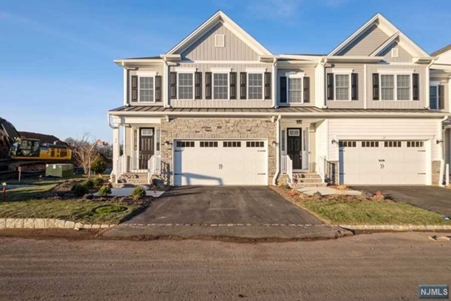 The epitome of townhouse living, right in the heart of Old Tappan! This is a wonderful opportunity to live in the coveted Enclave at Old Tappan. This roomy corner home offers 3 bedrooms, 2.5 baths, and 2 car garage. Enjoy open floor plan luxury and oversized windows which bring in enviable sunlight. First floor features entry foyer, living room with gas fireplace with remote, chef's kitchen with flawless finishes such as Quartz countertops, oversized center island, and top-tier stainless steel cafe appliances, elegant dining area, powder room, and easy access to patio. Second floor has fabulous primary suite adorned with walk-in-closet and full bathroom, two additional bedrooms, full bathroom, loft, and convenient laundry room. The unfinished basement offers plenty of storage. Close to NYC transportation, award winning schools, Old Tappan golf course, shopping and more! Landscaping and snow removal are included in the rent.