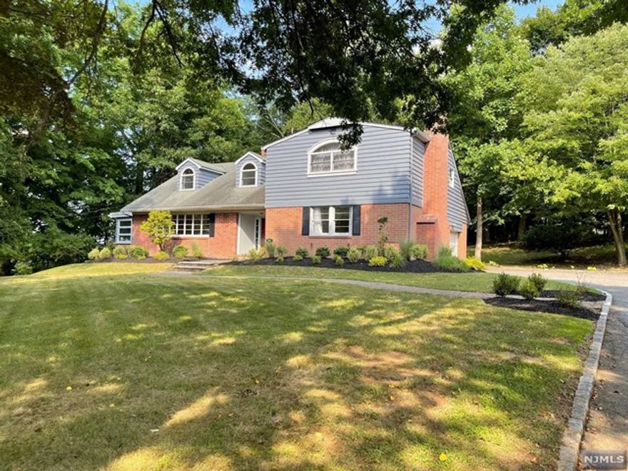 Spacious North Caldwell House for rent with large size rooms. Four bedrooms - three full baths and powder room and great flex-space on a residential road in town! One ensuite bedroom with full bath and glass sliders to a view. Office on First Floor, enclosed sunporch. Easy NYC commute, train and bus one town over! Tenant to maintain the house and grounds, including small repairs and liability insurance in addition to content insurance. Tenant responsible for snow removal, lawn maintenance, all utilities. Tenant to purchase Home Warranty for coverage. Garbage removal and recycling included. Owner holds a NJ real estate license.