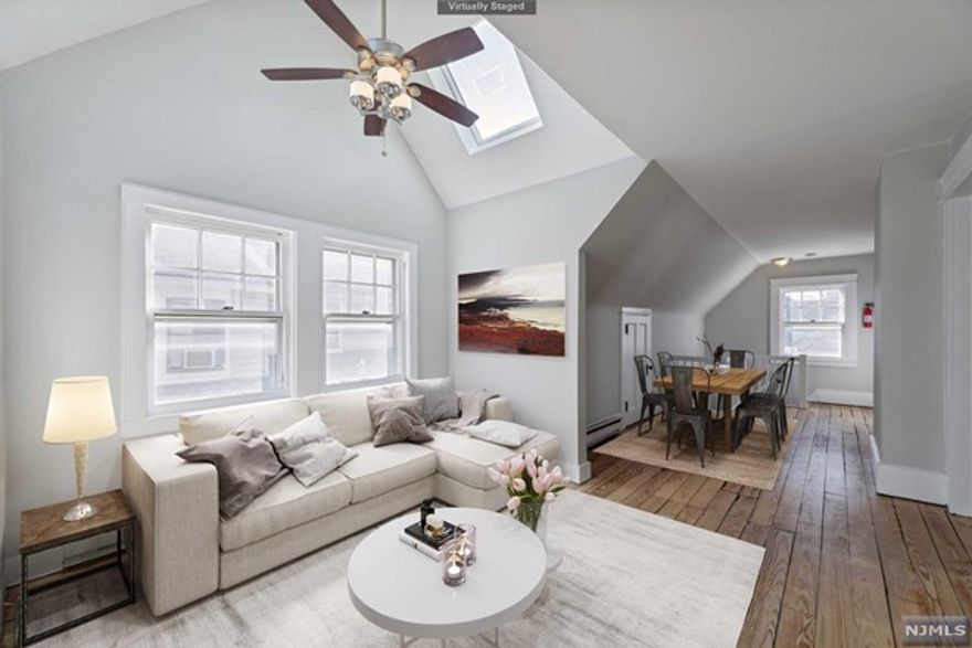 PRIME MONTCLAIR LOCATION! This apt is central to all Montclair has to offer. Whether you are catching a show at the Wellmont or indulging in the amazing restaurant scene, you never have to worry about finding a parking spot when you live this close to it all! A COMMUTER'S DREAM as this location is just blocks to Bay St. train Station & the NYC bus stop. A Montclair rental with FOUR BEDROOMS does not come along very often! Fully updated and filled with natural light, this unit has plenty of windows, freshly painted walls and newly stained hardwood floors throughout. Classic Montclair charm with tall ceilings and ornate trim work. This two floor unit has everything you need- 4 spacious bedrooms, 2 different living spaces, separate dining room, cozy sunroom & eat-in kitchen with stainless steel appliances. TWO PARKING SPOTS-garage and assigned driveway. Laundry & storage in basement.Landlord would consider adding laundry on 3rd fl. Units like this do not come around very often!