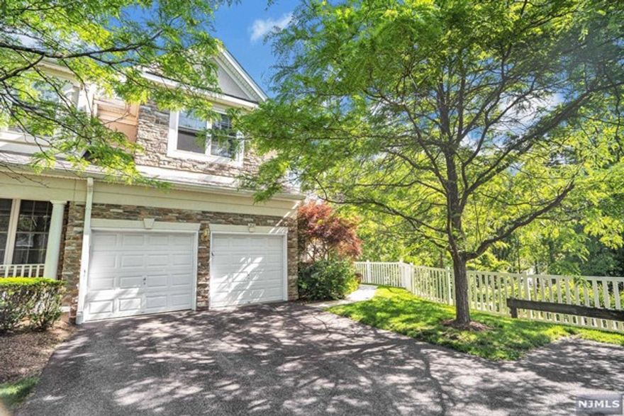 Perfectly situated to offer corner-unit privacy, unique additional private parking and breathtaking 3-season water views, this gorgeous Wellesley model is all about lifestyle! Spacious open floor plan features a two-story entry foyer, great room with fireplace, dining room, modern eat-in kitchen with granite, breakfast room, & office with French doors. Serene nature views on the patio through sliders off the main living area. Second floor hosts the primary bedroom ensuite with tray ceiling, full bathroom/ jetted tub, & two walk-in closets, two additional large bedrooms & family bathroom. An entertainer's dream, the full walk-out basement offers bar area opening to rec room/gym, a media/play room enhanced with sound-proofing, a craft room with ample storage, & access through sliders to a covered patio with ample private grassy area. Elegance abounds with recessed lighting & trim package throughout. Value + with new HVAC, Hot Water Heater & New windows with transferrable warranty!