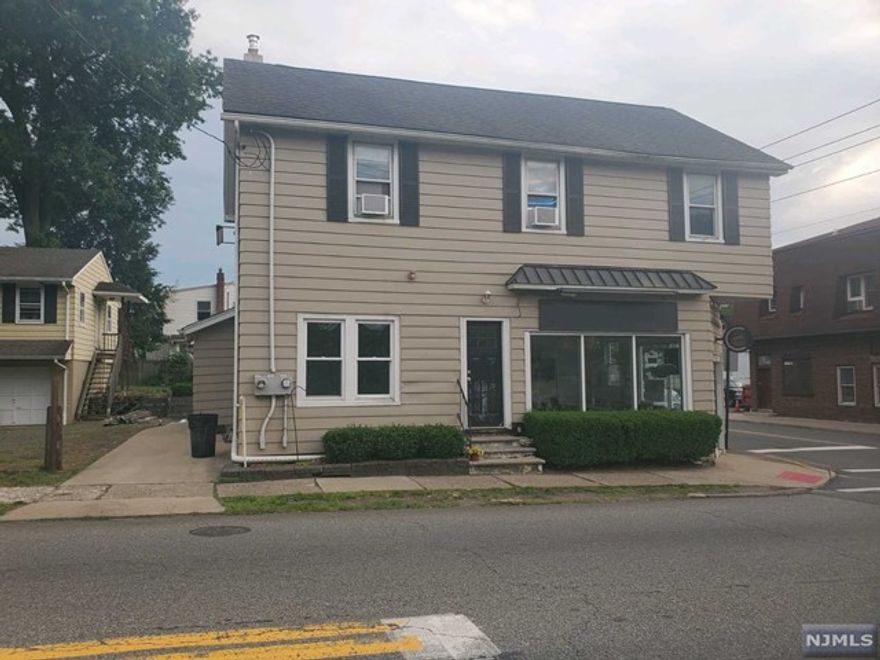 GREAT INVESTMENT PROPERTY CURRENTLY OFFICE/RETAIL ON THE 1ST FLOOR. UPSTARIS HAS 2 BR APARTMENT LEASED MONTH TO MONTH. VERY SPACIOUS. PARKING ON PROPERTY. THE PROPERTY COULD POSSIBLY BE CONVERTED TO A TWO FAMILY HOME.