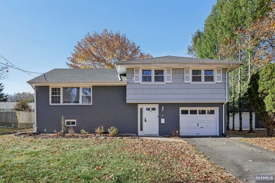 Welcome to 10 Julia St, the heart of Closter! Good sized bedrooms, recessed lights, open kitchen, and full bathrooms with renovated, hardwood floors are included! The ground floor has a den for office space and the fully finished basement is great for activities or a playroom for children. Please enjoy the perfect sized backyard with your family. Don't miss the Blue Ribbon School and convenient living area!