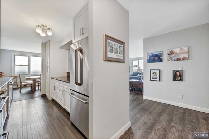 Enjoy world-class views from the 23rd floor, which features two fully equipped bathrooms and three tastefully renovated bedrooms. The expansive living area, full dining room, terrace, and state-of-the-art galley open kitchen with granite counters and a subway backsplash make it the epitome of living. The maintenance fee includes taxes and all utilities. A garage space costs $60.00 for parking. Spectrum and Fios are wired into the building. Board consent is necessary. Olympic outdoor tennis courts, pickleball, basketball, and pool. A community room and an indoor gym.