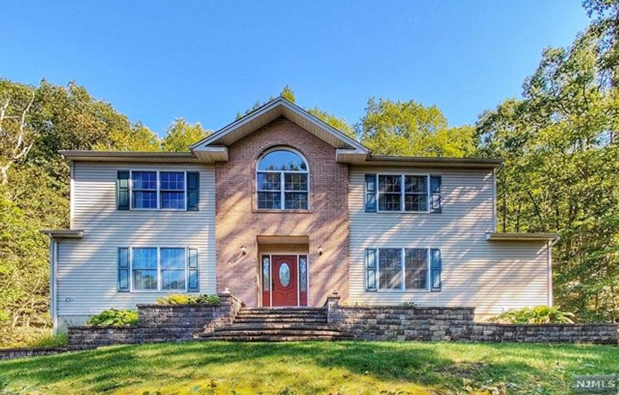 Welcome to this private and peaceful Colonial home, nestled on a spacious 3,7 acre property. Tucked away from the street, this charming home is ready to welcome you with numerous interior updates including the modern kitchen. With 4 bedrooms and 3,5 bathrooms, this home offers ample space for an extended family. Inside you will find an open floor plan that is perfect for both everyday living and entertaining guests. One of the highlights of this home is the family room, complete with cozy gas fireplace. Sliding doors lead to a sunroom, where you can relax and unwind in the spa hot tub. The finished lower level offers additional space, including a sauna and full bathroom. Two car garage has been professionally finished. Outside, the property boasts mature landscaping, with an outdoor patio that adds to the aesthetics. Despite its peaceful surroundings, this home is conveniently located just minutes away from schools, shopping areas and major highways.