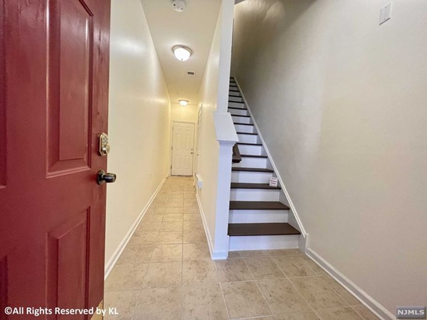 Convenient Location for NYC commuter with short distance to Passaic Train Station ... This 1425-SqFt 2BR 2.5Bath TOWNHOUSE features with new floors throughout; Sunny Bright 9ft high ceiling main floor with Living room, Dining area & Kitchen, Powder Room and Laundry room on main floor as well; Top floor with 2 Bedrooms and 2 Full Baths; Ground floor has a garage and entrance Foyer ... Low HOA $299.67/month, real estate taxes $8852/year ... Investors are welcome!