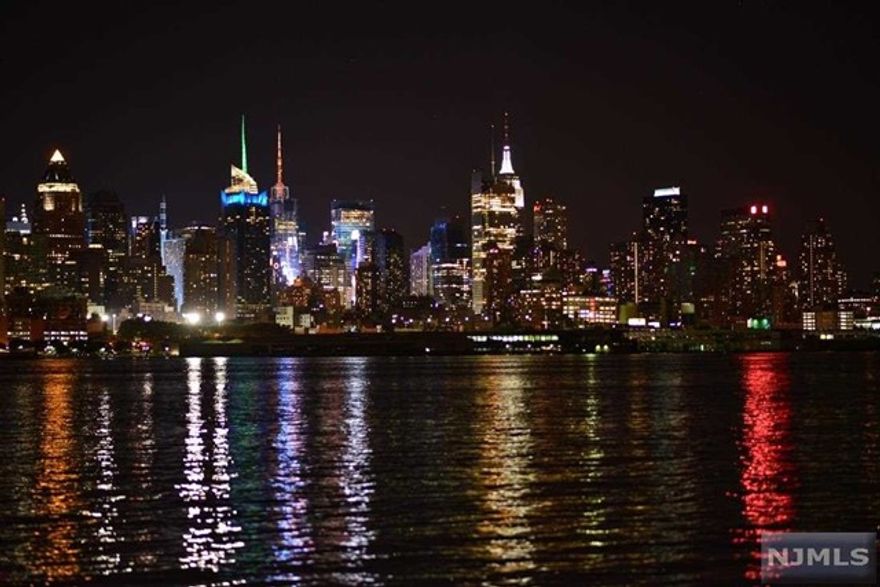 Welcome to Galaxy Towers Condominium, where luxury meets convenience in the heart of Guttenberg, providing an array of desirable amenities. This exquisite 1 bedroom, 1.5 bathroom condo offers 1,045 sf of meticulously designed living space, showcasing breathtaking NYC Skyline & Hudson River Views from every rm. Brand new luxury vinyl seamlessly integrates the living areas. There's a conveniently located powder rm by the entryway. The primary bedroom has an ensuite bathroom & a generous size WIC with/custom shelving, while ample custom shelving closet space thru-out the unit ensures effortless organization. MKIT is equipped with SS appliances, granite countertop, & a peninsula countertop enhances functionality as both a workplace & a cozy breakfast nook. Nice size dining rm offers versatility, can easily be transformed to a den or home office to accommodate your desires. Unit has direct access to the garage. Maintenance fee: All utilities & complex amenities. Trans to NYC 18 mins.