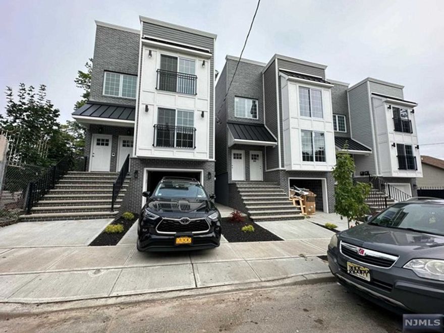 Welcome to this newly constructed 3-bedroom, 2-bathroom apartment on the second floor in Newark, NJ. Upon entering, you'll find an expansive floor plan that includes an eat-in kitchen with a central island, a dining room, and a living room. The master bedroom features an en-suite bathroom with a shower and a walk-in closet. There are also two spacious bedrooms with closets and a second bathroom with a bathtub located off the living room. Sliding doors lead to a Romeo and Juliet balcony. Additional features include a laundry area, street parking, and extra storage space in the attic.