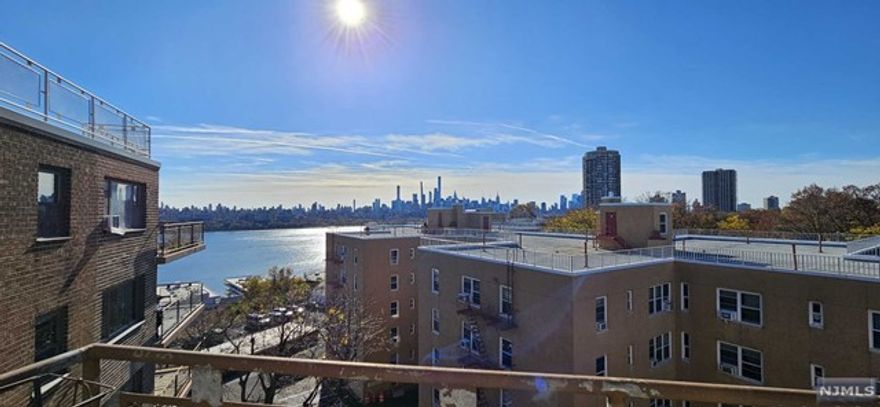 Just Completed! Beautiful Penthouse-Level Condo Renovations - Available Now! Watch the new video upload on 11/7/2024. Be the first to claim this exceptional, newly RENOVATED condo with breathtaking NYC views! Move in before the new year and enjoy a stunning makeover completed on November 2nd. Unit 8B, a 1-bedroom haven spanning 773 sq. ft., boasts panoramic vistas of NYC, the Hudson River, and James J. Braddock Park. Recent upgrades include laminate wood floors, fresh paint, and a sleek new storm door. Relax on your private east-facing balcony (6x21 ft) and watch the sunrise each morning. With all utilities included in the HOA, on-site laundry, and dedicated parking, you'll find convenience and luxury in one package. Perfectly located on the North Bergen and Edgewater border, you're steps from parks, shopping, and transit, with quick access to NYC via the Lincoln Tunnel or NY Waterway. Make it yours today!
