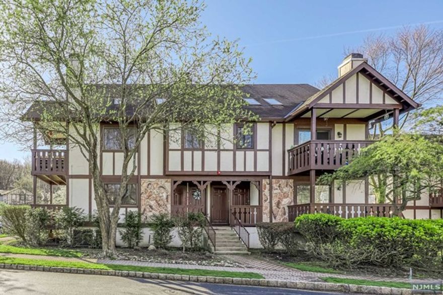 This delightful condo presents a fantastic opportunity for first-time buyers or downsizers seeking a comfortable lifestyle in desirable Mahwah, offered at an exceptional value. Enjoy convenience of low taxes & modest maint. fee of $330 monthly, which incl water. Nestled within the charming Ridge Gardens complex, this pet-friendly community boasts tennis, pickleball, & pool. Situated on the 1st floor, this end-unit condo features a bright and inviting atmosphere, complemented by a private balcony w/lush landscaping for added tranquility. The unit includes washer & dryer & designated storage. The interior showcases laminate flooring, carpet, kitchen is appointed with granite countertops, decorative subway tile backsplash, and SS appliances. The full bath w/tub has replaced vanity w/ granIte. Home includes c/a, well-maintained mechanics, custom blinds, Anderson wind.w/warr, screened door, high-hats in BR, lgclosets and a bonus is the included electric portable FP, Ample parking.