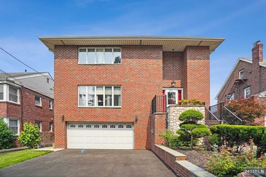 Why rent a duplex in Palisades Park when you can rent a 4,500+ square feet house situated in a prime location? This all-brick colonial home offers five (5) bedrooms and four (4) full bathrooms and has all the tools to serve as a perfect family home. All rooms are more than generous in size with the master suite being a phenomenal highlight of the house with its walk-in closet and ensuite master bath. In addition, the ground floor offers another bedroom/recreational room perfect for entertainment of all kinds which comes with a full kitchen as well. Lastly, the backyard is immense to say the least perfect for family gatherings or children to run around at the safety of their own home. Two-car garage at your disposal as well. Location of the home is unmatched as it lies between Broad Ave and Grand Ave which allows walking distance to restaurants, shopping, and NYC transportation.