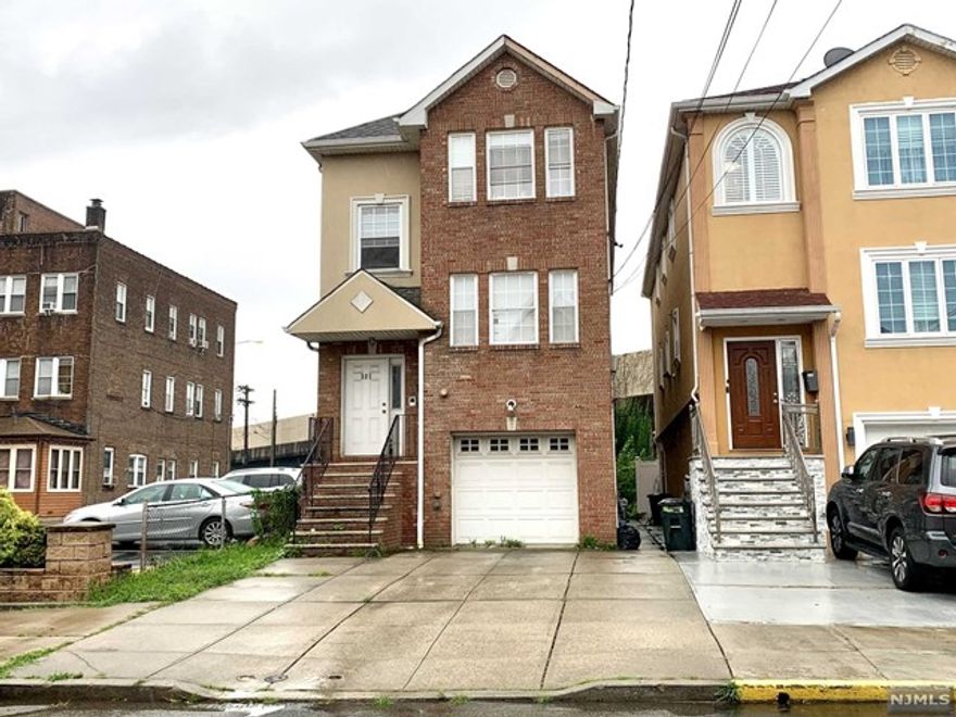 1st & Ground floors being used together as one apartment in a 17-year old 2-family home. Available to occupy on September 1st. Central air. Hardwood floors throughout 1st floor. Ground floor has additional ductless HVAC. Refrigerator, Dishwasher, Washer, Dryer, Deep Garage & 1 driveway parking space included. No pets. Tenant is responsible for removing the snow from the driveway, the front steps and the sidewalk. Tenant has the privilege of using the yard and patio and is responsible for the maintenance of same in neat and clean condition. Tenant pays for heat, hot water, gas, & electric. 1.5 months security deposit. Maximum: 4 occupants. Tenant credit & eviction check required. Photos taken before current tenants moved in. Easy commute to NYC: 9-min walk to Harrison PATH Station. Close to NJIT, Rutgers, NJPAC, and Prudential Center. Convenient to Turnpike, Parkway, Rt. 280 & Rt. 21. Available to occupy immediately.