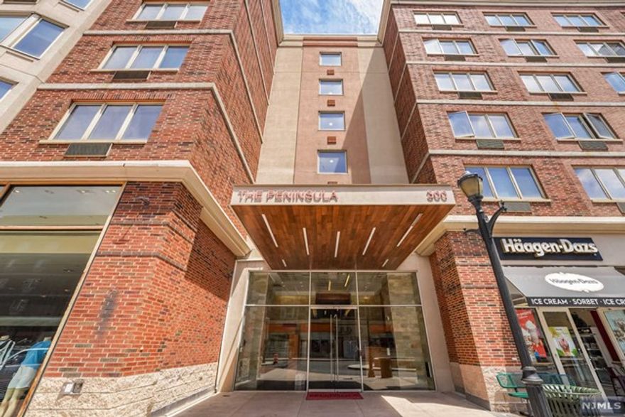 Wake up with the sunrise in this spacious 1BR+Den/1Ba home in The Peninsula at City Place. This home features wood flooring throughout and is approx 1,128 sqft. Enjoy the chef's kitchen featuring SS appliances and granite countertops with an open concept which allows for easy entertaining, and opens to the living and dining area. The spacious bedroom features an en-suite bathroom and oversized walk-in-closet. The in unit washer/dryer and garage parking makes this truly a place you'll want to call home! The unit is conveniently located in building 2 and close to all community amenities; fitness center, a children's play room, 24 concierge, and much more. Unlike any other community in the area, you can enjoy shopping, restaurants, and easy access to NYC all within your own complex.