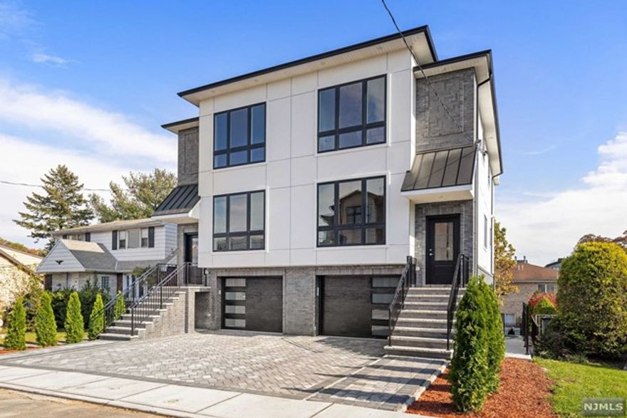 New Construction Townhouse for Rent with Private Rooftop Patio - Live above it all in Cliffside Park! This new modern townhouse encompasses 4 levels of living space, multiple private outdoor spaces, open layout, modern design, attached garage, gas fireplace and more! The ground floor fam room has extra high ceilings. Plenty of storage space, Located near express transportation and all NJ highways! Come take a look!