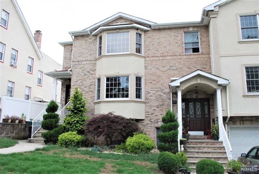 Spacious 2nd floor unit, fully updated, offering 2000 sq ft of living space. Features include 3 bedrooms, 2 full bathrooms, and a versatile bonus room ideal for an office, nursery, or junior bedroom. The apartment comprises a living room, eat-in kitchen, and a master bedroom with an en-suite bathroom. Additional amenities include a laundry room with a washer/dryer and attic storage. The master bedroom boasts 2 large walk-in closets, a private bath with a spacious shower stall, double sink granite countertops, and a luxurious Whirlpool tub. Abundant closet space is available throughout the unit. The landlord requires a background check, proof of income, and a completed rental application. No Pets. 1.5 month security, and 1 month broker fee due at signing.