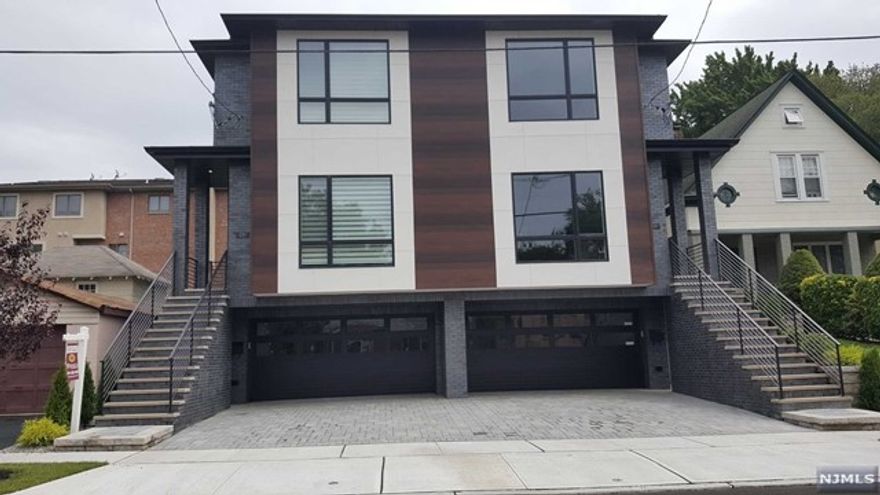 BRAND NEW ALL BRICKDUPLEX IN PRIME LOCATION(ONE BLOCK AWAY FROM BROAD AVE). MORDEN DESIGNED HOUSE FEATURES HARDWOOD FLOORS THROUGH,10FT CEILING WINDOW LIVING ROOM,WITH FIRE PLACE ,LARGE QUARTS CENTER ISLAND KITCHEN WITH HIGH END CUSTOM MADE CABINETS,TOP APPLIANCES,FLOOR TO CEILING SLIDE DOOR TO PATIO,HALF BATH,2ND FLOOR OFFERS FLOOR TO CEILING WINDOWMASTER BR,TOP QUILITY MASTER BATH,2BRS,FULL BATH,WASHER/DRYER,SKY LIGHT. GROUND FLOOR OFFERS OFFICE,FULL BATH, VISIBLE GARAGE DOOR 2 CAR GARAGE ,FLAT DRIVE WAY. CLOSE TO TRANS, CLOSE TO SHOP..