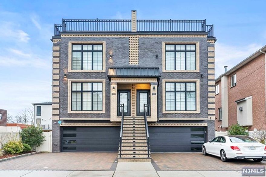 LUXERY LIVING IN PRIME LOCATION!!! 3 BEDROOM, 3FULL BATH &2HALF BATH WITH THE ROOFTOP VIEW. GROUND FL HAS A GAS FIREPLACE, FULL BATH, WET BAR, SEPARATE A/C AND HUGE STUDIO LEAD TO THE BACK YARD. THE 1ST FL HAS A GAS FIREPLACE. OPEN LAYOUT LIVING ROOM LEADING TO EAT-IN KITCHEN W/STINLESS STEEL APPLICANCES & CENTER ISLAND AND SLIDERS TO THE DECK. THE 2ND FL FEATURES A GRAND MASTER BED &BATH, 2 ADD'L HIGH CEILING BEDROOMS WITH A FULL BATH. THE 3RD FL HAS A KITCHENETTE, A HALF BATH AND ROOF TOP DECK WITH VIEWS OF THE NYC SKYLINE. YOU MUST SEE THE MORDERN HOME!!