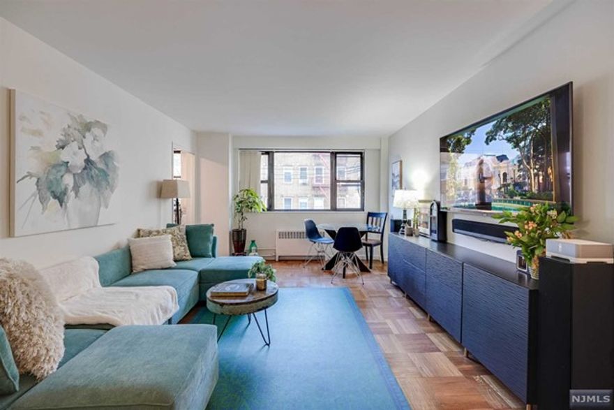 Large, bright one bedroom one bath CONDO on BLVD EAST. Kitchen and bathroom recently renovated. Bedroom easily fits a king sized bed with lots of room for a desk too. Sizable living room includes space for dining. High ceilings, hardwood floors and lots of closets throughout. Easy commute to NYC with a bus stop in front of the building. Walkable to grocery store, restaurants and shops in the neighborhood. Amenities include elevator,24 hour doorman, gym, and laundry room. All utilities included except electric.