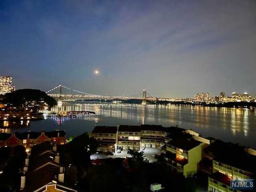 Luxury Living on the Hudson River! Proudly presenting this inviting, sun-filled and spacious 2 bedroom, 2 full bath apartment home with absolutely stunning panoramic views of the GWB, Hudson River and NYC sklyne. This unique living space is conveniently nestled in a 24hr gated, riverfront development in Edgewater, New Jersey known as Hudson Harbour Condos. This 24hr doorman hi-rise tower boasts an elevated outdoor pool, tennis court, play space, park like sitting area and so much more. This uniquely designed space features an enormous wrap around terrace, spacious rooms, galley kitchen, modern baths, hardwood flooring throughout and six closets. Monthly maintenance includes ALL utilities, 24hr doorman/guardhouse, cable/internet package, outdoor pool, tennis court, play area & fitness room. One outdoor parking space included in sale as an assignment. Truly A Must See!