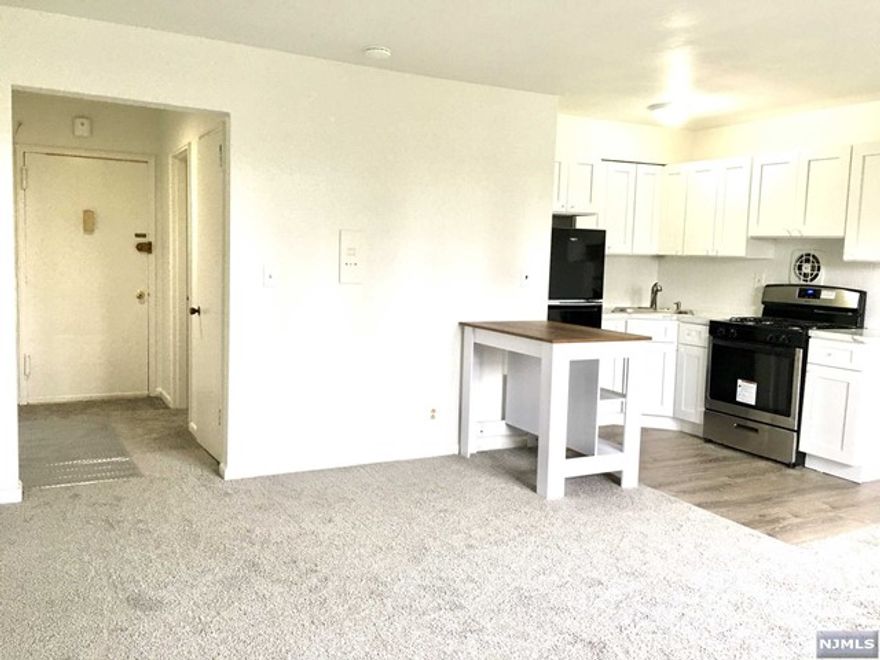 Bright top floor east facing studio .New Kitchen, all new appliances and new carpet . It has an extra closet, laundry on site. One block to Elementary School 1, main street, Firemen's Park, Public library and walking distance to GWB. Best convenient location for schools/Commute/Park/Shopping/All. One parking space, heat, water and hot water are included in the rent. No pets. Renter's insurance required. Due upon lease signing--- 1st month's rent, 1.5 month security deposit, 1 month broker fee and condo fees($550--$150 refundable).