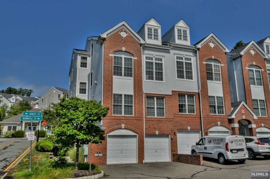 Welcome to this charming 2-bed, 2.5-bath end-unit townhouse in Lafayette Hills. This impeccably maintained home combines comfort, convenience, and a tight-knit community feel. The first floor features an open layout with a sunlit living room with expansive windows, dining area, and kitchen. The kitchen boasts stainless steel appliances, granite counters and ample storage. Upstairs, discover a spacious living area and two generous bedrooms, including a primary suite with walk-in closet, en-suite bath, and private balcony. The upstairs also features a second full bath, laundry closet and utilities. Additional features of the unit include an entry foyer with access to a finished basement area that can be used as a home office or for extra storage. You will also find direct interior garage access to the unit, and an elevator serving all 3 levels. Lafayette Hills offers a pool, clubhouse, fitness center, dog park, and much more! Great opportunity awaits-come see this unit today! :)