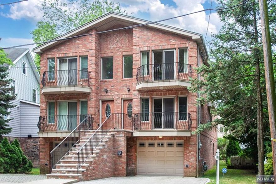 YOUR SEARCH ENDS HERE!! Welcome home to this solid brick townhome, featuring hardwood floors, a fireplace, granite countertops, stainless steel appliances, a jacuzzi, and more. Make your way to the first floor into the living room that leads you to the dining room, kitchen, and access to the back deck. 2nd floor is where you will find the master suite with walk-in closets and a full bath. 2 additional, spacious bedrooms and a full bath complete this level. Ground-level is access to 1 car garage, 1 car parking, family room, office, and full bath. Tenants are responsible for utilities. Tenants are responsible for the first $100 of all damages and full for any damages caused by the tenant, responsible for snow removal, the tenant need to carry liability coverage of $300k, and tenant needs to sign up PSEG Worry Free. NTN Report required income requirements. The landlord is responsible for lawn maintenance.