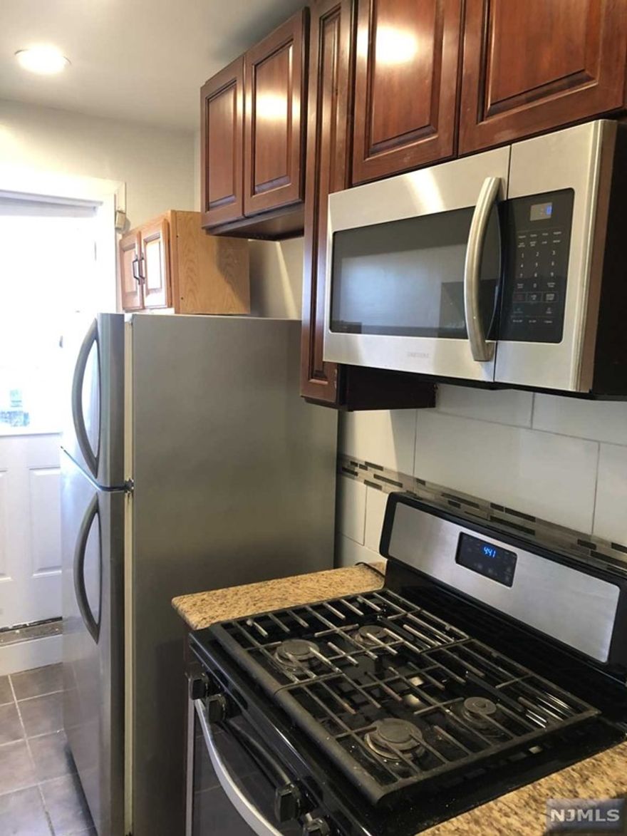 HEAT INCLUDED - First floor 1 bed 1 bath updated apartment. Close to EVERYTHING ! NYC transportation, McKinley Elementary, & shopping/restaurants. Access to yard w/ deck. Pets conditional for additional fee.