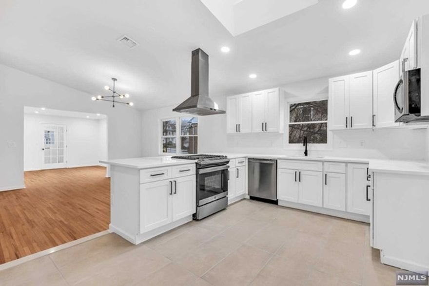 W**Call Listing Agent at Prominent Properties Sotheby's Office: 201-223-4207**elcome to this massive and bright fully renovated home just half a block from Yanticaw Park in beautiful Nutley. Amazing natural hardwood floors sprawl throughout the first and second floors and are accompanied by luxury vinyl wood floor on the lower level. The oversized kitchen features a large peninsula and space for an eat-in kitchen table and brand-new SS appliances. High ceilings and a skylight allow for amazing natural light. A large Dining and Living space round out huge open concept main level. Upstairs features 2Beds including a massive primary bedroom and a fully renovated bathroom. The lower level includes another large living/flex room, bedroom, full bathroom and laundry room. Central Heating and Cooling. A large, shared driveway leaves ample space for 2 Car parking without having to move cars around. Don't miss out on this unique space that feels like home.