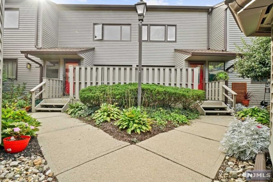 You can sell the lawn mower but you will want plenty of flower pots for the sunny deck of this light and bright 2 bedroom, 2 full bath unit in Mahwah's prestigious Ramapo Ridge complex. Everything on your wish list is waiting for you, including a handsome front porch, open floor plan, classic living room, spotless kitchen with breakfast bar, over-sized dining room with sliders to the beautiful deck, large master bedroom with master bath, great closet space and easy first floor leaving. And don't forget all of the additional amenities offered by Ramapo Ridge which include the clubhouse, beautiful swimming pool, tennis court, exercise room, playground and much more. This unit will not last long as this incredibly reasonable offering price.