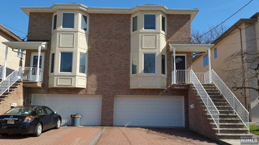 3 BEDROOMS AND 3.5 BATHS LOCATED ON ONE OF THE MOST DESIRABLE STREETS IN PALISADES PARK. FLAT GROUND LEVEL HAS 2 CAR GARAGE, FINISHED FAMILY ROOM WITH SIDE ENTRANCE, FULL BATHROOM. MAIN LEVEL FEATURES BAY WINDOW LIVING ROOM WITH FIREPLACE, DINING ROOM, MODERN ISLAND EAT-IN KITCHEN WITH STAINLESS STEEL APPLIANCES, GRANITE COUNTER TOPS, SLIDING GRASS DOOR LEADS TO OVER SIZED PRIVATE DECK. UPSTAIRS FEATURES MASTER BEDROOM, MASTER BATHROOM WITH RADIANT HEATED FLOOR, 2 ADDITIONAL BEDROOMS, A FULL BATH AND WASHER/DRYER. CUSTOM MOLDINGS, CUSTOM STAINED HARDWOOD FLOORS THROUGHOUT, C/V, AND MUCH MORE. MUST SEE!