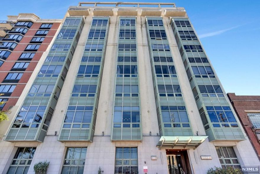 Welcome to your new home at Zepher Lofts. From its sprawling 925sqft with 13ft industrial style ceilings this one-bath condo has it all. This full service luxury building is only minutes to the Hoboken PATH. The west facing home features an open living area with extra large windows, modern kitchen , Stainless Steel appliances, with breakfast bar seating, and plenty of storage. The Loft offers a separate bedroom area with custom closets, renovated bathroom, Central HVAC, hardwood floors throughout, and in-unit washer/ dryer. Enjoy the convenience of a 24-hour concierge, on-site fitness center, beautiful landscaped courtyard, elevator, and garage parking (available for additional monthly fee). Commuting to NYC is a breeze with the PATH and bus located nearby. Available now.