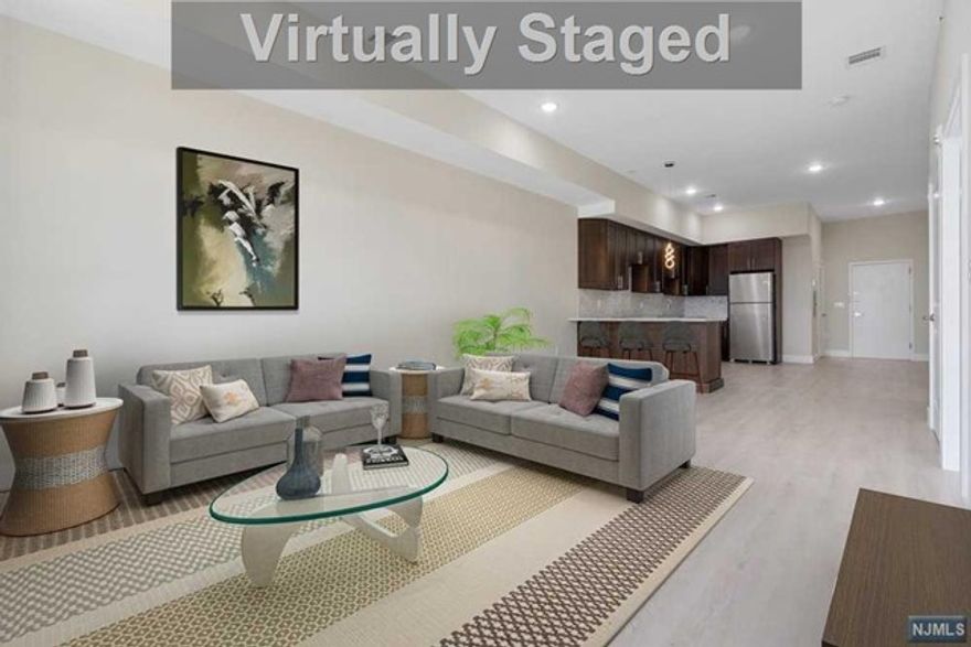 Welcome to The Maximilian this brand new luxury building in the heart of Belleville! Building includes designated yoga, fitness, common areas & incredible rooftop lounge with outdoor kitchen/grill, pergola and seating overlooking spectacular NYC views. 1 car parking for each unit included in rent. All units include brand new stainless steel appliances, quarts counter & stackable W/D. Spacious peninsula for 2-3 bar stools, separate dining area & living area. Living area & bedroom feature a lovely NYC view, wake up every morning to beautiful sunrise lighting. Great sized bedroom with large closets. Spacious bath with tub. Conveniently located near bus stops,trains in surrounding towns. Ample amount of diverse restaurants & shopping. High efficiency water heaters. Separate HVAC units. Central a/c & forced hot air. Tenant pays gas,electric & water. Cats & Dogs OK!! Beautiful lobby with elevator access to each floor. Mailroom/ amazon hub. Cafe in building coming 2024!