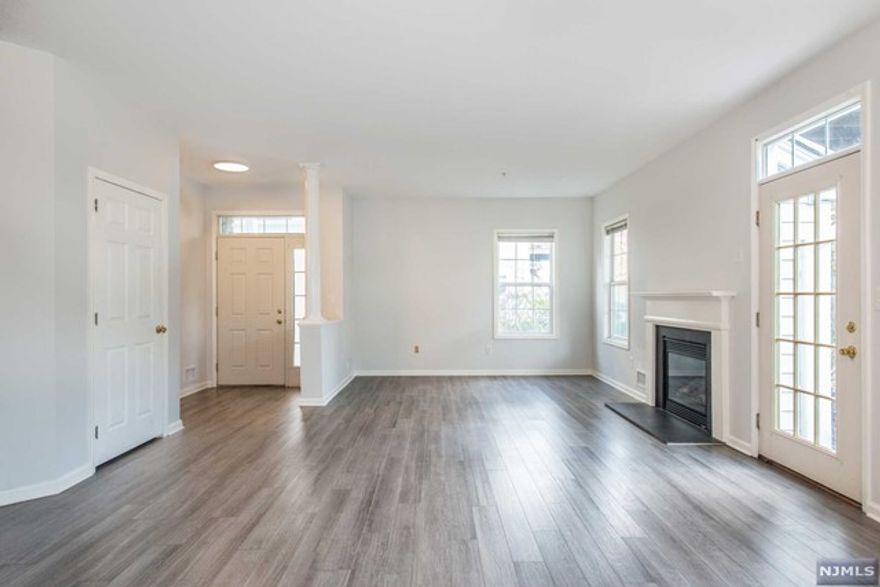 Gorgeous one floor unit in Cambridge Crossings. No stairs! Walk-out to large patio, fireplace, open floor plan, large master suite and much more! Gated community with a pool, exercise room, saunas, clubhouse and more. The Clifton Train Station and NYC buses are less than 1 mile away!