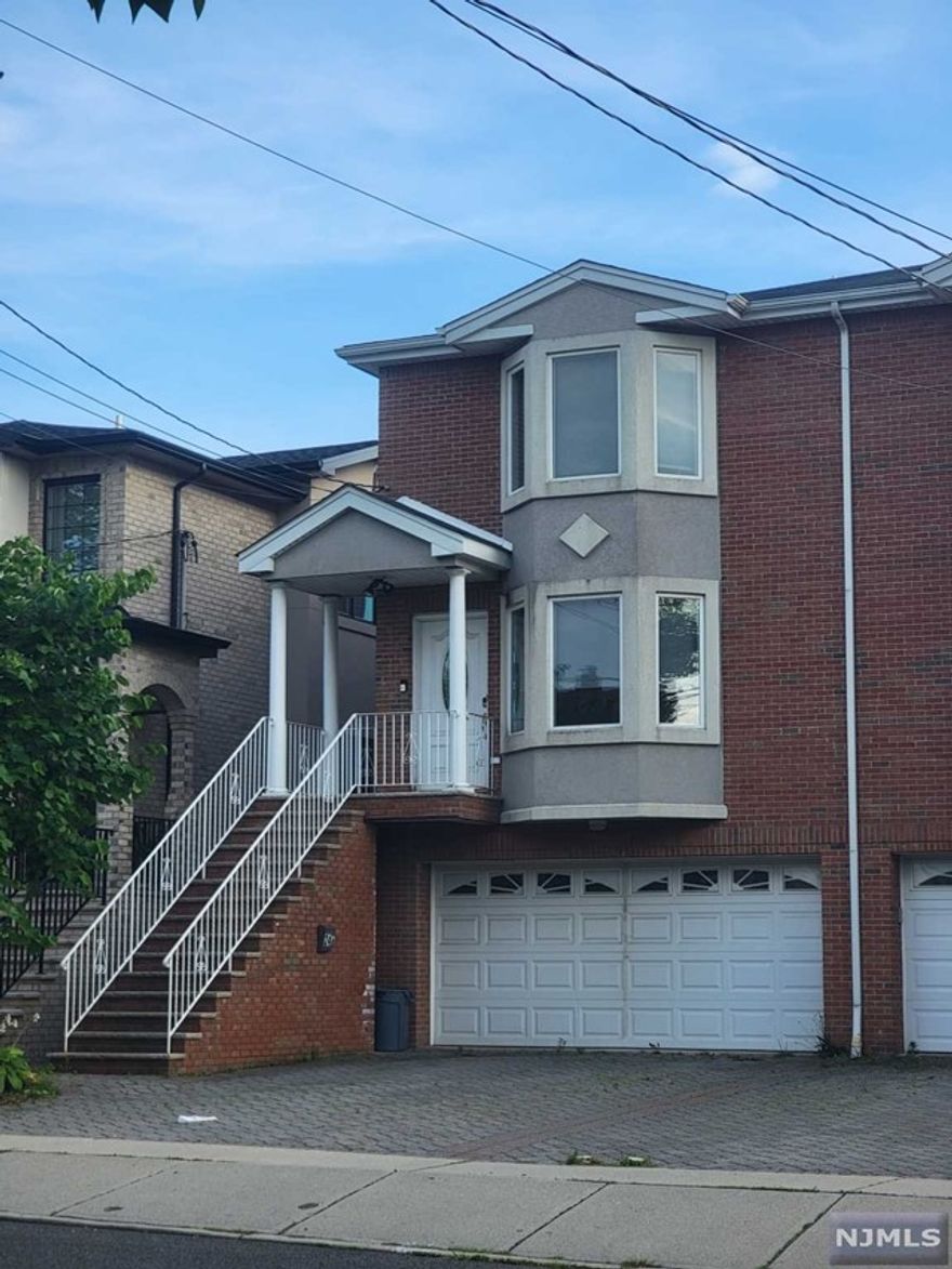 Duplex is located one block from the Broad Ave. Enjoy hardwood floors throughout, and an open floor plan that connects to the dining area and modern eat in kitchen. This spacious modern kitchen features granite counter tops and stainless steel appliances. The second floor offers three bedrooms with a large master suite and nice size closets. The basement is finished which gives you many recreational options. Location has a easy access to schools, shopping, major highways, and an easy commute to NYC.