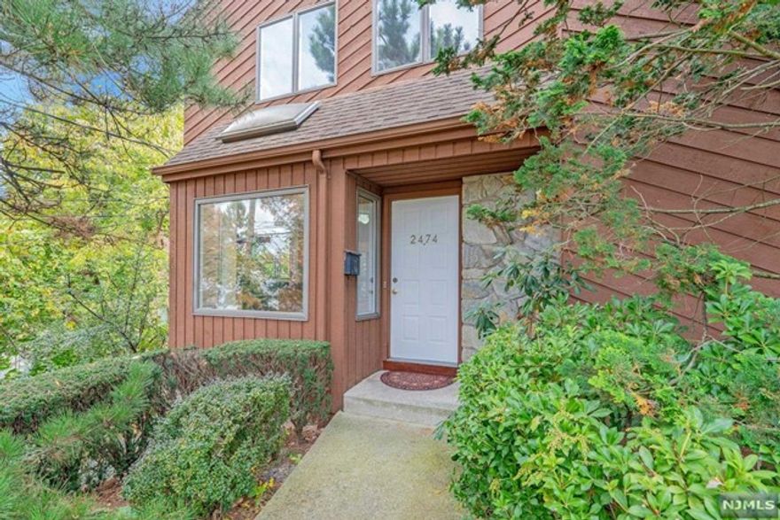 Rarely found a 3 story the largest end unit townhome set on a desirable street on the Englewood Cliffs border. Granite Entrance foyer leads to modern eat-in kitchen w/ two extra windows, granite countertops, stainless steel appliances, new backsplash and separate breakfast area. Formal dining room /w windows. Sunken family/living room with wood burning fireplace & grand heightened ceiling with double sliding glass doors leading to a full balcony and updated powder room.Second floor features a primary bedroom suite with newly updated bathroom including tub and double sink. Second bedroom w/ WIC, 3rd bedroom, full bath /w new vanity, mirror & light. The lower level features a family room with a new laminate floor, storage area, newly updated powder room,2-car garage & laundry. New CAC compressor. Low maintenance. Close to public transportation, NJ highways and Fort Lee School #3. Hardwood floor through. Hot water baseboard heating system & Central Air. Street level main/1st floor