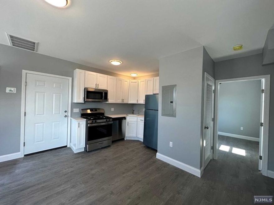 Fully renovated second floor apartment, brand new appliances, washer/dryer in unit, hardwood floor, central air, parking available, close to mass transit.