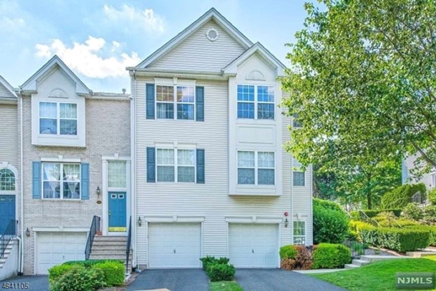 STUNNING UNIT IN CAMBRIDGE HEIGHTS! This incredible fully updated unit is nestled in Nutley's highly sought after Cambridge Heights community. From high, vaulted ceilings to convenient loft overseeing the living space, to spacious master w/ en suite, this unit has it all! Kitchen features stainless steel appliances including wine fridge, granite countertops, extra tall cabinets, and dining area. Living room features vaulted ceilings and gas fireplace. Upstairs you'll find the loft perfect for office space or play area. Two large bedrooms including massive master bedroom w/ double vanity ensuite and large walk in closet. Dark stained hardwood floors throughout, and the entire unit has been freshly painted. Large one car garage and directly situated across from extra visitor parking. Do not miss this incredible opportunity to own in this community!