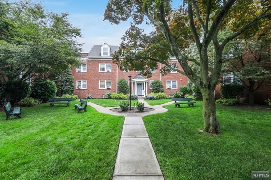 Light and Bright Corner Unit with Southern and Western Exposures and Front Facing Windows onto Elm Avenue. Updated Kitchen and Bath and Hardwood Floors Throughout. Terrific Location near the center of Cedar Lane shops, Restaurants, Grocery Stores, Express Buses to NYC and Fun. Walk to EVERYTHING !! Laundry in Basement. On Street Parking.