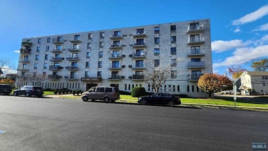 Super clean and freshly painted in neutral tones! This spacious one bedroom is in move in condition. Updated with beautiful wood laminate flooring and ceramic tile. Living room with terrace. Large kitchen with breakfast bar. Good sized bedroom features large closet. Covered parking space #7 Washer dryer in unit. Credit score must be over 690 with yearly income of 70k.Convenient location to NJ transit and buses. A must see to appreciate!