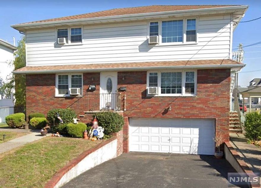 Call Gary at 201-776-6000 to see this second floor apartment today! Complete with a large eat in kitchen, enormous living room with large walk in closet, full bathroom and three oversized bedrooms. One of the bedrooms can also be used as a formal dining room. The unit has been freshly painted, and all hardwood floors have been refinished. The tenant will have shared use of the backyard, as well as partial storage and laundry hook ups in the garage. The location can't be beat...close to major highways and super convenient to everywhere else!