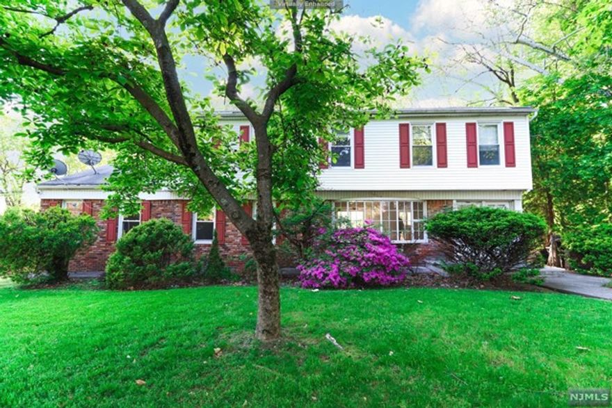 Looking to live in well desired Paramus? Here's your opportunity! Move right into the first floor of this two family home. The walls have been freshly painted and the hardwood floor has been resurfaced and stained. This rental offers a large living room, kitchen, dining room, three spacious bedrooms, two bathrooms, an unfinished basement, and a two car garage. The first floor has access to the large backyard and deck accessible through a sliding glass door in the dining room. Laundry room is located in the basement! Don't miss out! Request a tour today! No pets.