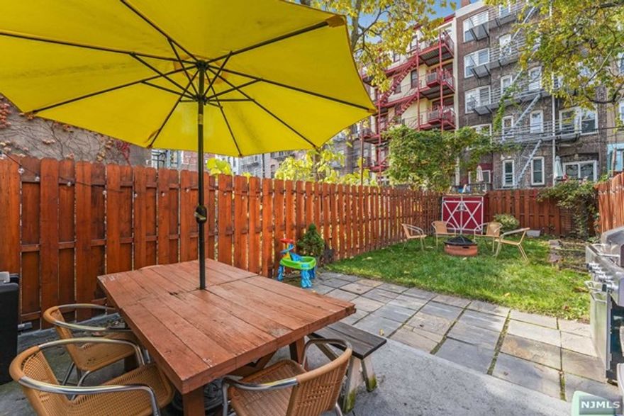 Looking for a move-in ready, beautifully maintained 2BD/1BA with a massive private outdoor space in the heart of Hoboken? Look no further! This beautiful garden level home features an open concept living room+dining combo, perfect for entertaining. It also includes an updated kitchen with a breakfast bar, granite countertops, stainless steel appliances and all the charm you could ask for with exposed brick in the bedroom, white-washed brick in the living room and french doors leading to the master bedroom. The home has a thoughtful layout with both bedrooms, drenched in sunlight, separated on either side. It also boasts beautiful porcelain floors, a brand new full-size in-unit washer-dryer, walk-in closet in the master, central air, brand new hot water heater and of course that beautiful backyard with a paved sitting area for those summer barbecues. With it's own private entrance with a Nest doorbell, this truly feels like home. Conveniently located on lovely tree-lined Park Ave