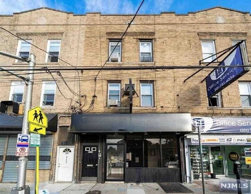 This extremely clean mixed use building in the heart of North Bergen can not be passed up! Zoned C1-A, the first floor retail space has great street visibility, and a bathroom in unit. The second floor unit has a gorgeous private staircase that leads to a spacious 3 bedroom 1 bathroom apartment, with hardwood floors. The third story unit mimics the second floor, with the 3 Br & 1 Bath layout. Out back is a shared patio, and a bonus grassed area.