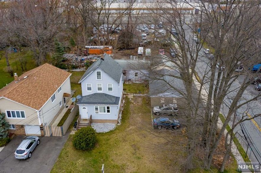 Corner Mixed-use property featuring a 2 family home with 4 garages and warehouse with an office as well as parking lot/outside storage situated on 23,529 sqft lot. Great for an end-user or investor. This property can be combined and purchased as a package with the rear property aka 2 Wiarda Way (additional outside storage and free standing 1.5 story building) MLS# 21009038. Total combined property size 46,324 Sqft.