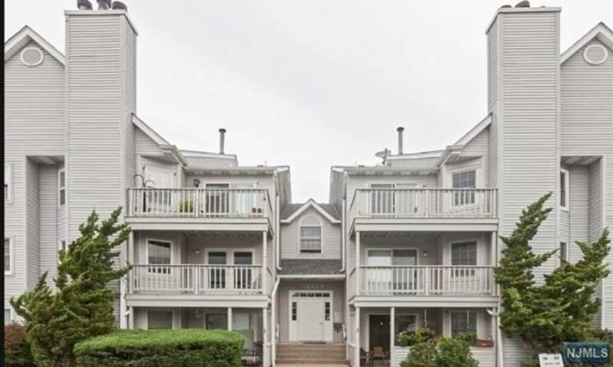 Welcome to this spectacular mountain views from your deck that awaits you at Garrett Heights condo. This Condo offers 2bedrooms/2 full baths. 1 with jacuzzi tub for you to relax in. Plenty of closet space. Open floor plan, living room w/wood burning fireplace, kitchen w/breakfast bar and dining room w/sliders to your stunning private deck. Wood floors throughout, Central Air and Laundry room in unit makes this amazing condo a perfect oasis! Within walking distance to Garret Mountain Reservation. FHA approved community. This pristine home has it all and won't last long. Close to all major highways.