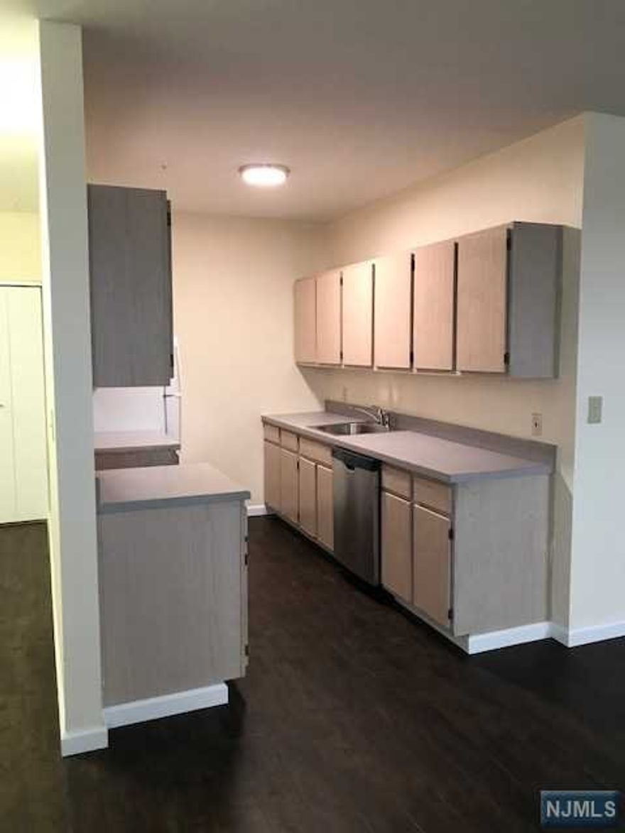 1 Bedroom apartment available on 2nd floor of elevator building. Apartments over the stores at Washington Commons Shopping Plaza adjacent to StopNShop. Vinyl flooring. Galley kitchen with lots of cabinets, dishwasher and electric stove. Water is included in the rent, the Tenant pays the electricity. Bathroom with shower over a tub. Washer and Dryer in unit. Onsite Parking. NO smoking of any kind, no pets.